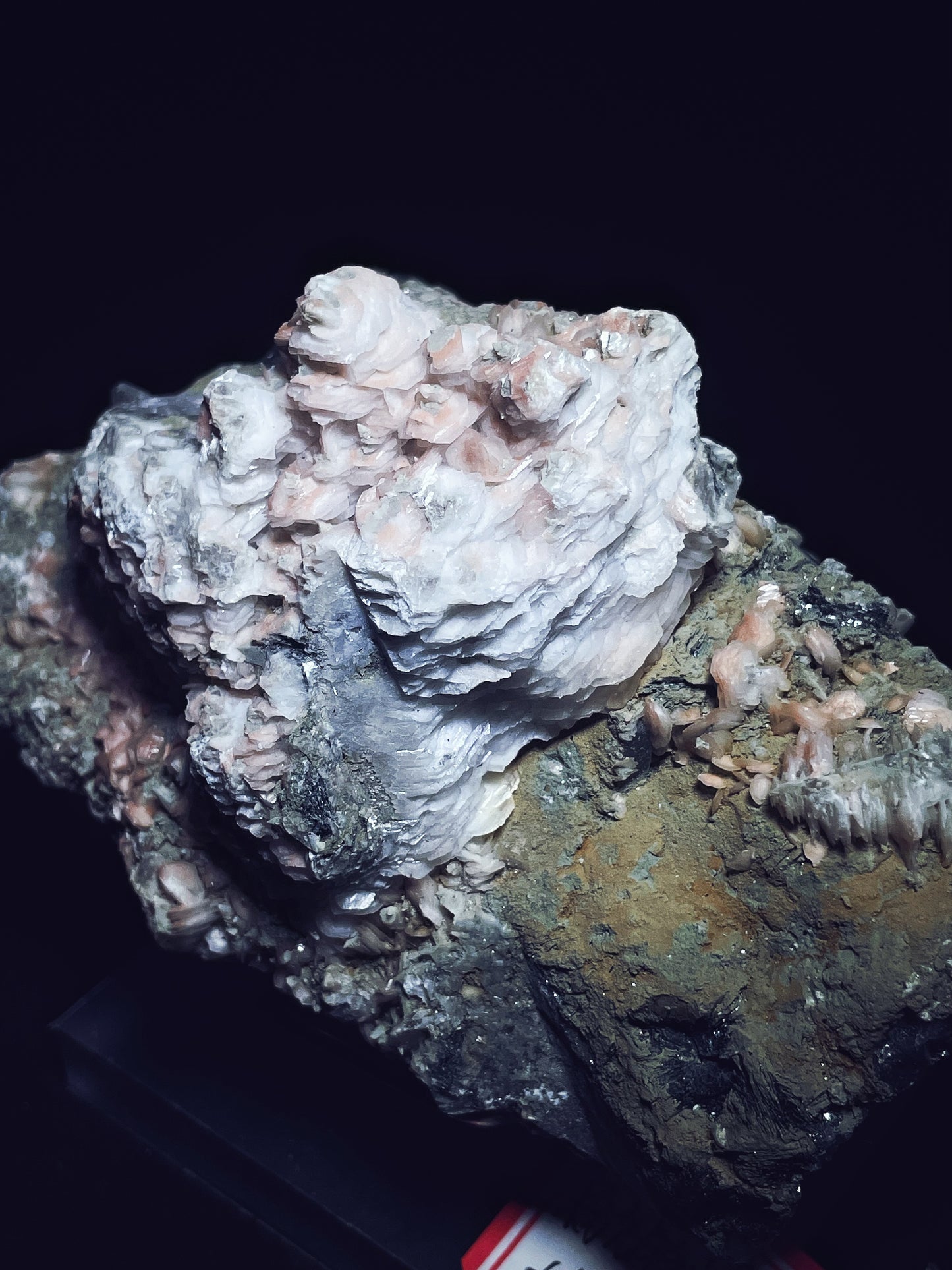 Pink calcite with quartz specularite specimen origin Inner Mongolia