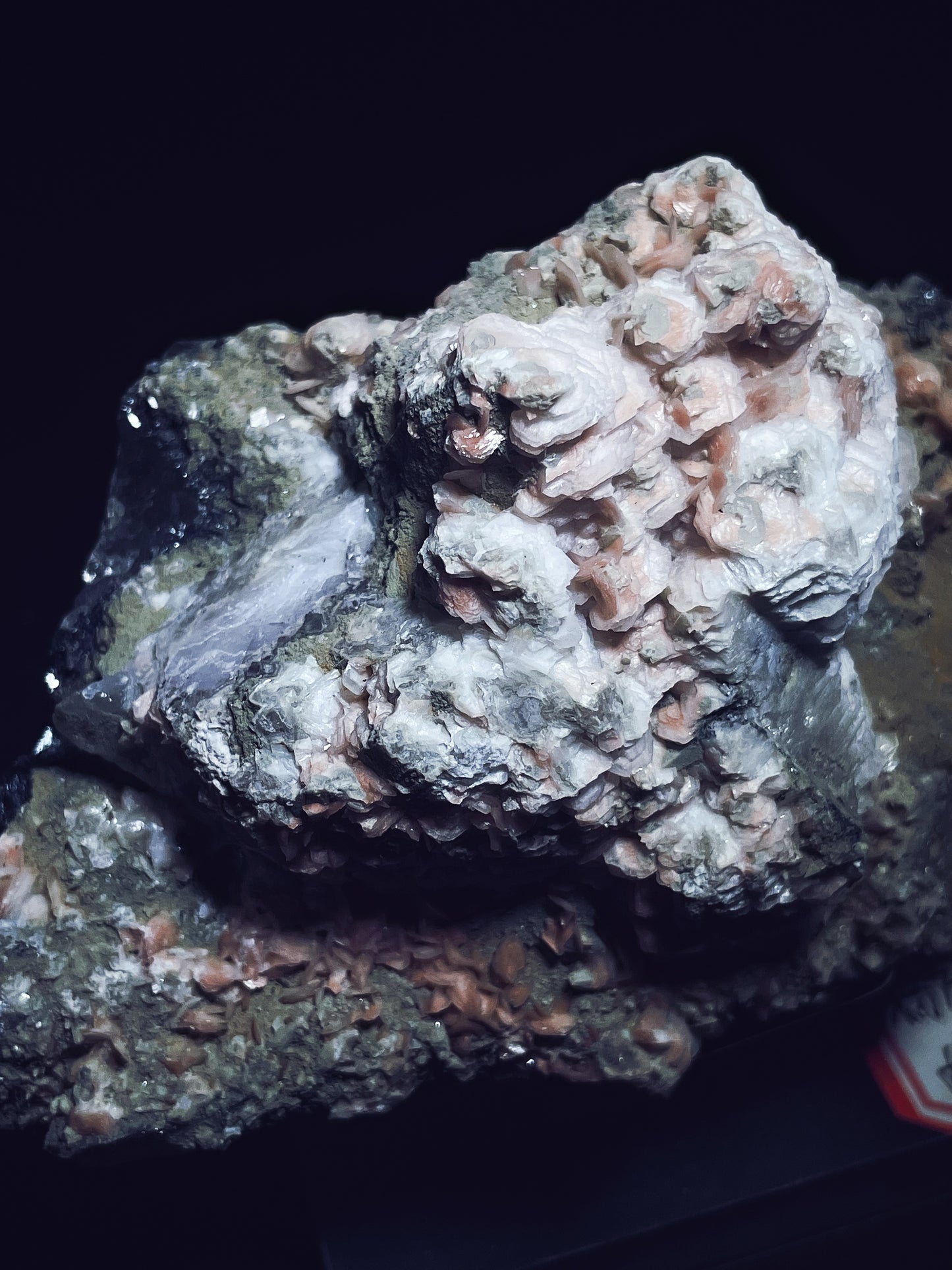Pink calcite with quartz specularite specimen origin Inner Mongolia