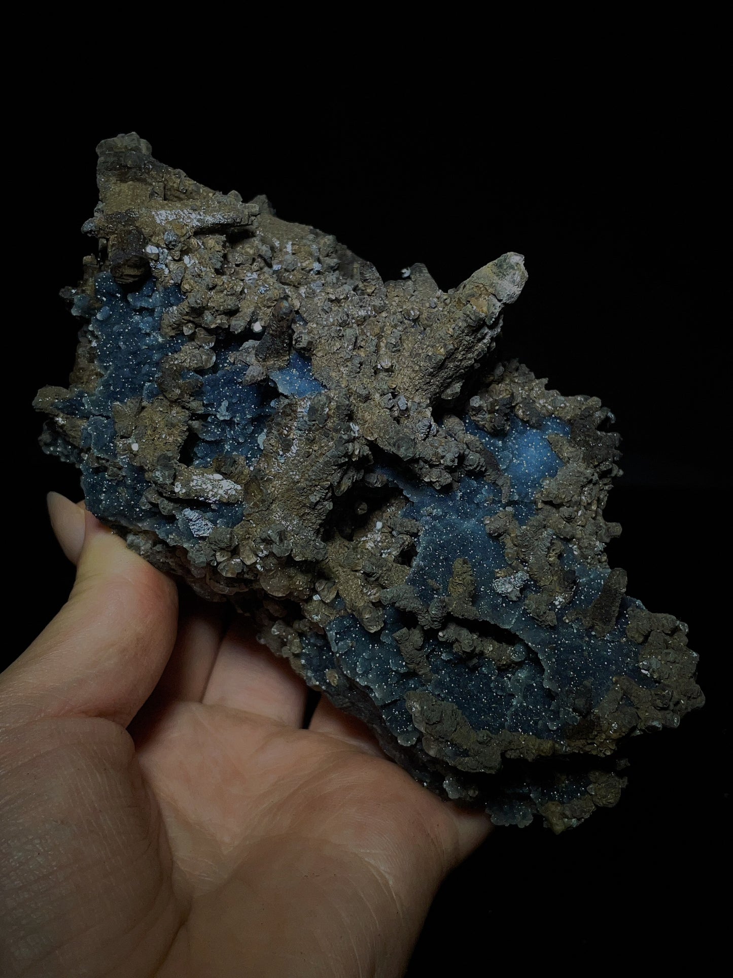 Brown rhombohedral calcite with sugar sphalerite from Zhudi Mine, Liancheng, Fujian, China.